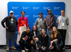 Współorganizatorzy festiwalu na tle ścianki UG