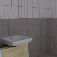 Zdjęcie przedstawia umywalkę w łazience Centrum Sportowego UG.